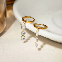 Gold Huggie Hoop Earrings with Dangling Zircon Stones – Elegant Minimalist Jewellery - DZOIR