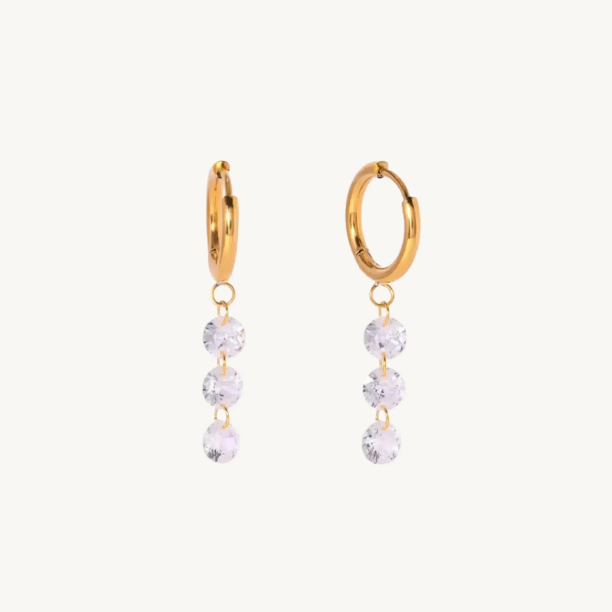 Gold Huggie Hoop Earrings with Dangling Zircon Stones – Elegant Minimalist Jewellery - DZOIR